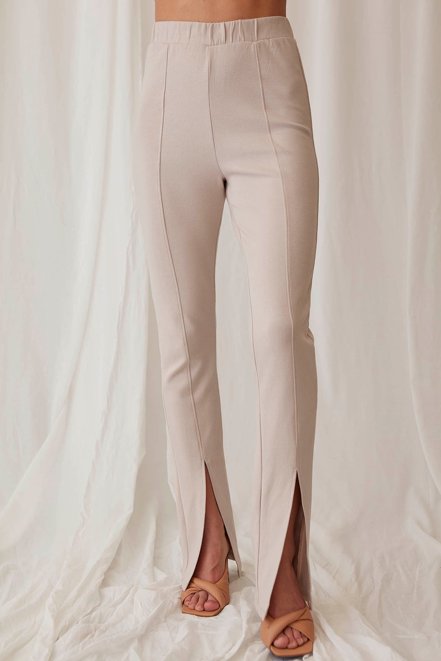 beige pants for work with front slit