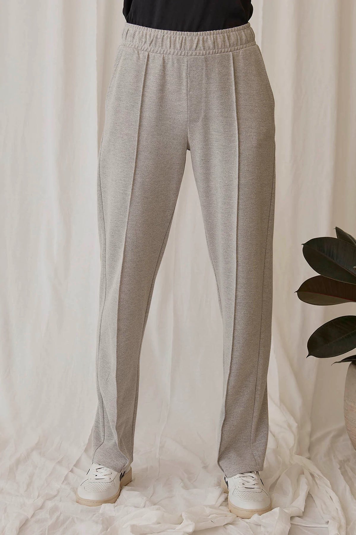 versatile grey pants for work and travel slow fashion
