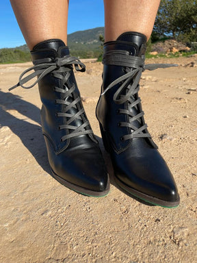 black lace up boots with pointed toe
